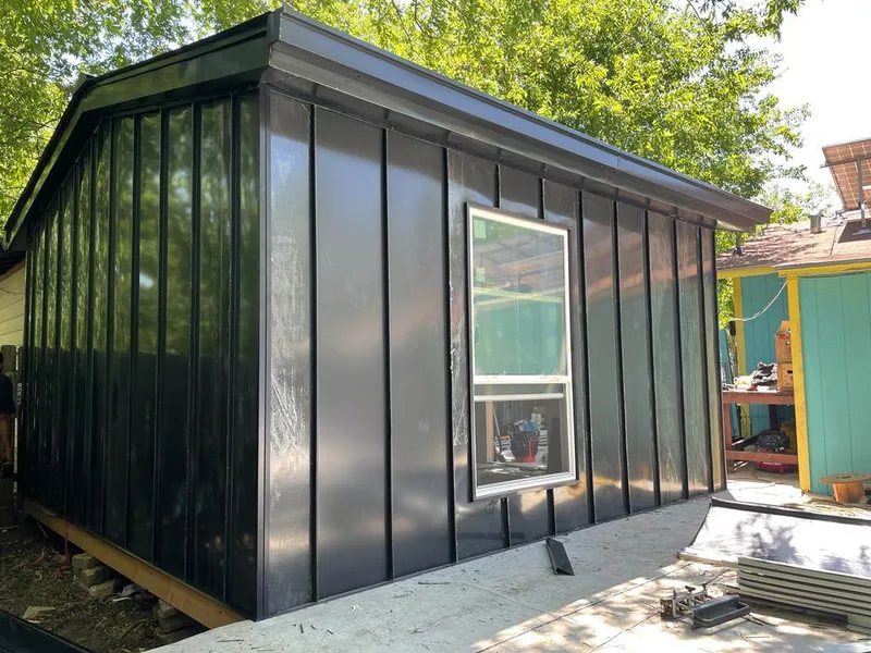 Black standing seam metal wall panels for Roof Inspection in Surf City